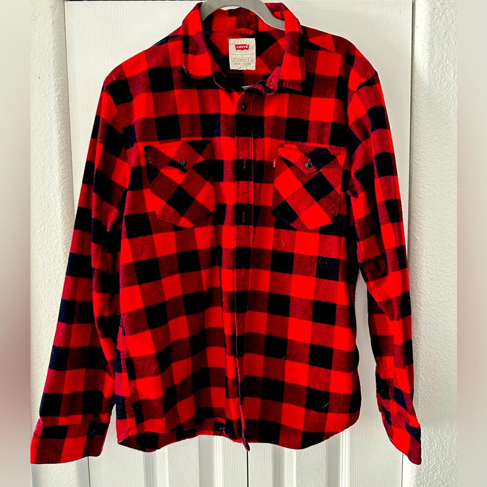 Levi’s flannel. Men’s size large. Red and black.